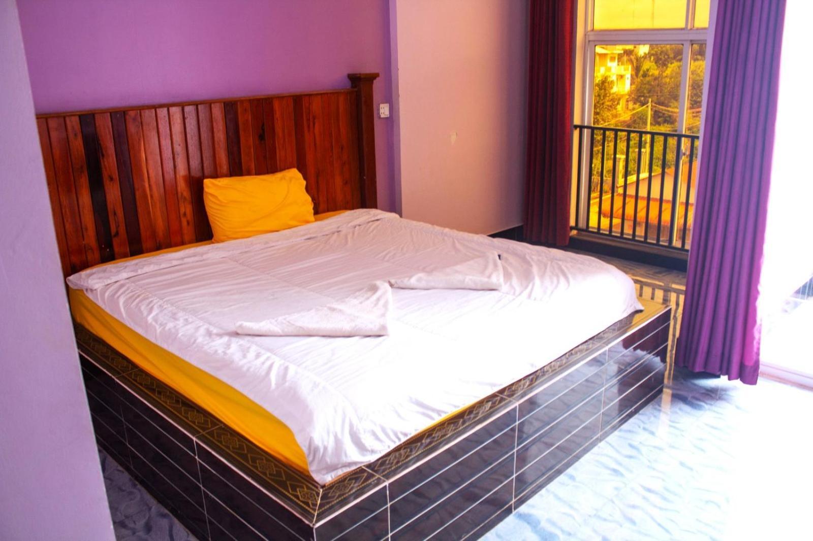 The Vibe Guesthouse カンポット 部屋 写真